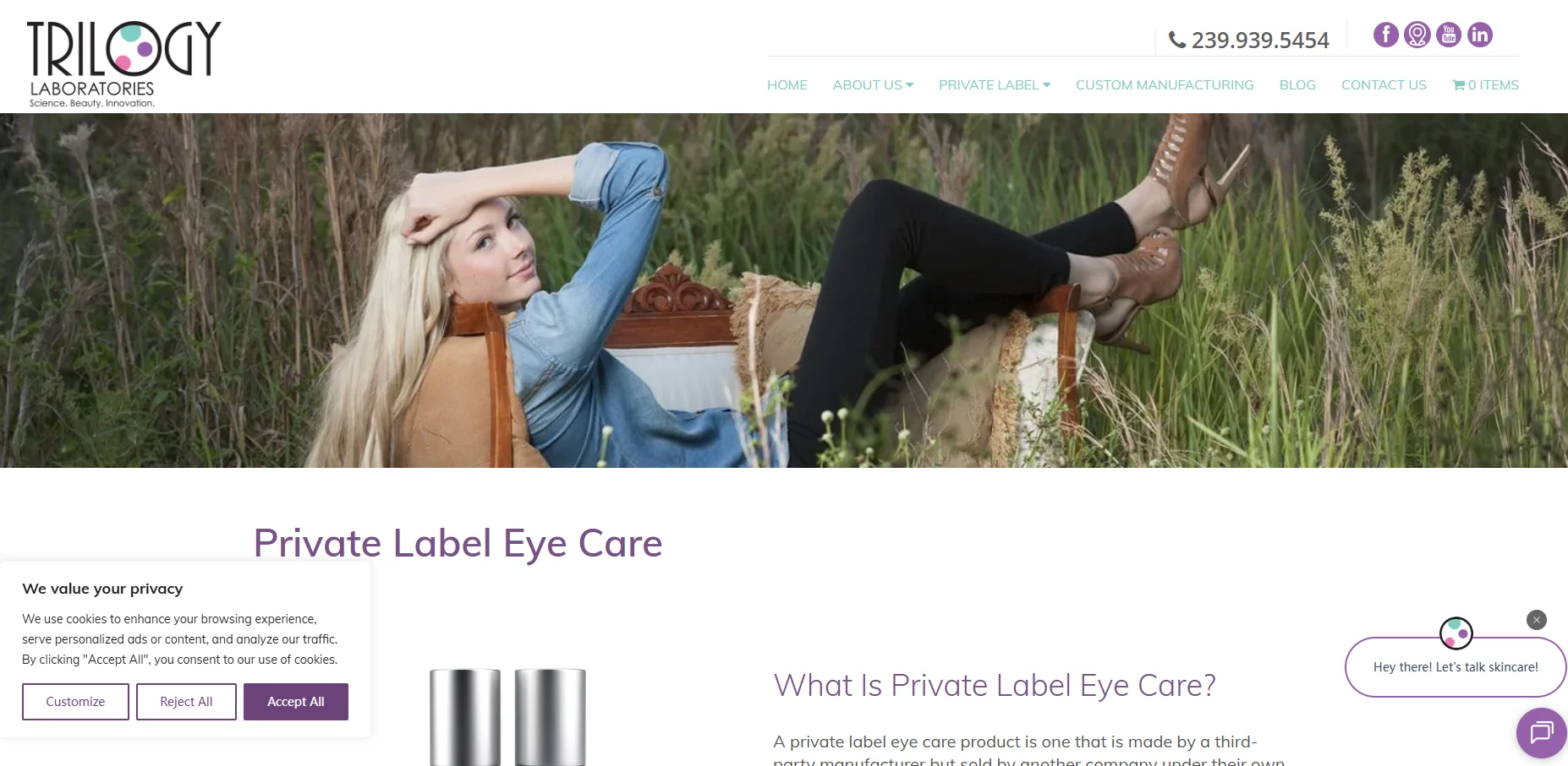 Skincare cream jar surrounded by lavender flowers.